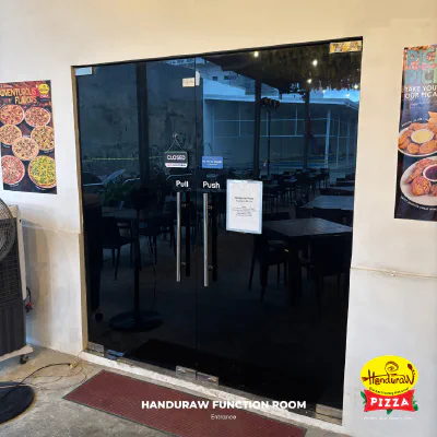 Glass double-door entrance to the function room